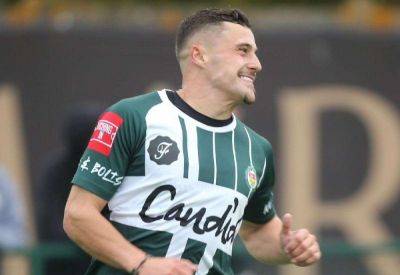 Craig Tucker - Isthmian League round-up: Louis Collins’ hat-trick leads 10-man Ashford to victory, Margate and Sheppey score injury-time winners, while Dartford hold unbeaten Premier Division leaders - kentonline.co.uk - county Bay