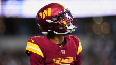 Jayden Daniels exits Commanders-Cowboys with hamstring injury - ESPN