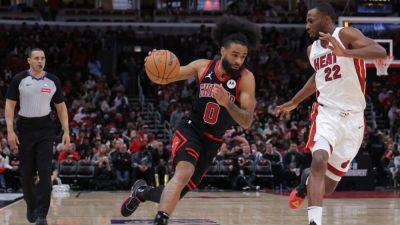Bulls' Coby White out at least 2 more weeks with calf injury - ESPN