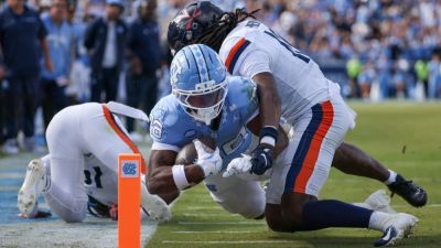 UNC falls short but shows improvement in OT loss to Virginia - ESPN