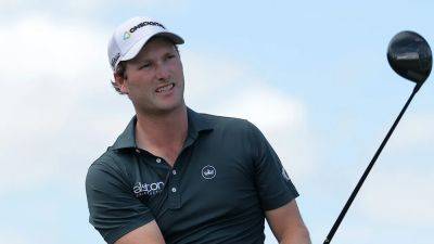 Alligator keeps close eye on PGA Tour golfer Vince Whaley while he takes swing near water - foxnews.com - Usa - state Mississippi