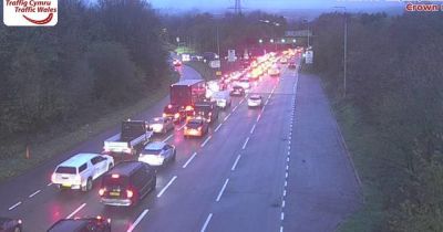 M4 crash causes delays as heavy rain throughout the night leads to warnings and closed roads - live updates