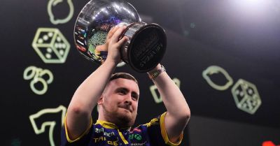 Luke Littler celebrates world number one status by retaining Grand Slam of Darts