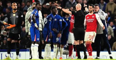 Ten-man Chelsea battle for a point against leaders Arsenal in fiery derby