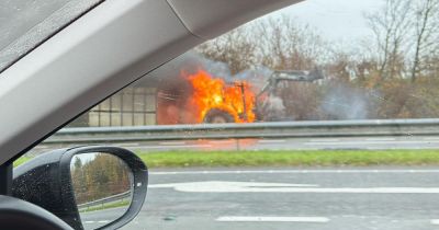 Dual carriageway shut as emergency services tackle tractor fire on key route - live updates