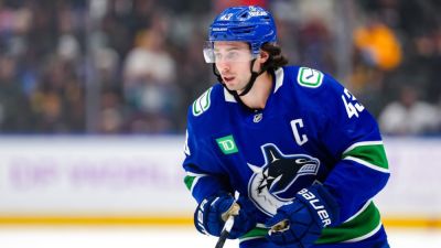 Canucks trade Quinn Hughes to Wild for three players, pick - ESPN