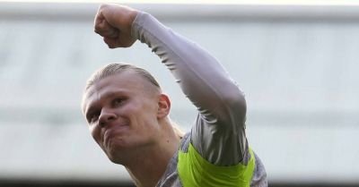 Erling Haaland scores twice as Manchester City close within two of Arsenal
