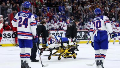 Team USA hockey defenseman leaves World Juniors game on stretcher after being struck by puck