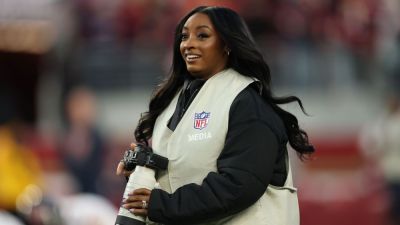 Simone Biles serves as credentialed photographer at Bears-49ers - ESPN