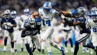 Amon-Ra St. Brown toughs out injury, fuels Lions in key win - ESPN