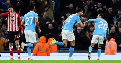 Man City close gap on leaders Arsenal with one-sided win over Sunderland