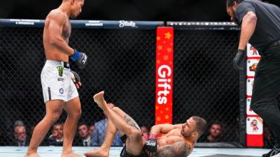 Van wins flyweight title after Pantoja injures arm at UFC 323 - ESPN