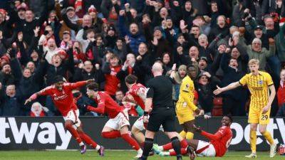 Forest thrash Brighton 7-0 helped by Wood hat-trick