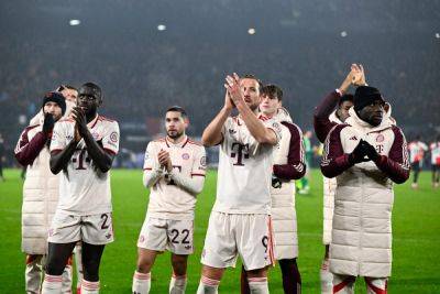 Bayern survive late Kiel fightback to go nine points clear