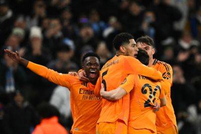 Bellingham strikes late as Real Madrid pile misery on Man City