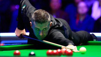 Mark Selby - John Higgins - Mark Selby edges out John Higgins in 'torturous' five-hour tie - rte.ie - Britain