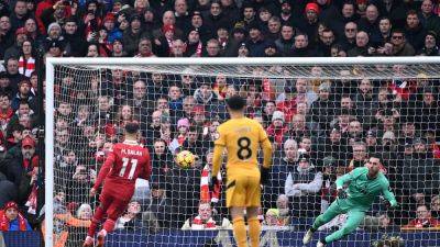 Liverpool survive nervy finish against Wolves