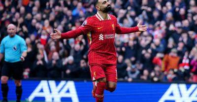 Liverpool survive late scare against Wolves to move seven points clear