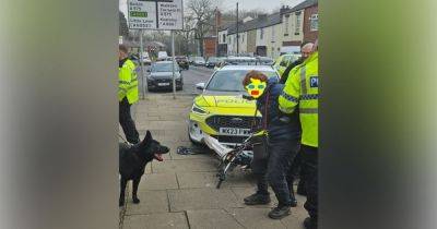 Two suspects carrying machetes arrested on Greater Manchester street