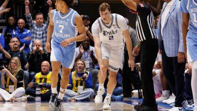 Cooper Flagg leads Duke to blowout win over rival North Carolina - ESPN