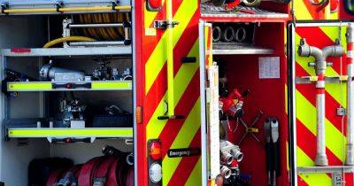 Salford fire sees firefighters urge people to keep doors and windows shut and to avoid area