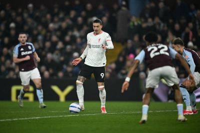 Liverpool’s title charge dented by Aston Villa draw