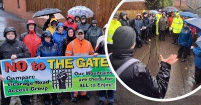 Residents gather in anger to take on neighbour's huge security gates - walesonline.co.uk