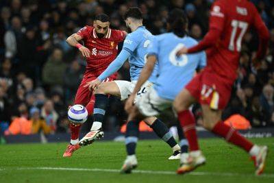 Liverpool beat Man City 2-0, go 11-point clear