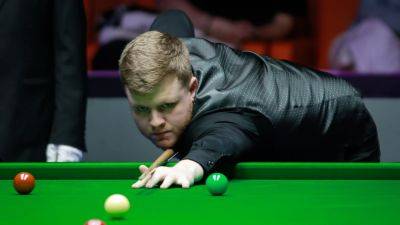 Aaron beaten in close match with Jimmy Robertson at World Open