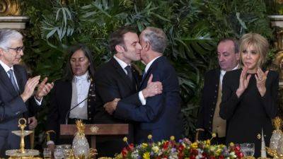 Macron says Ukraine is an 'existential' fight for Europe as he makes two-day state visit to Portugal
