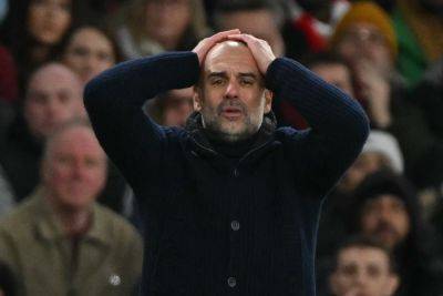 Arsenal crush woeful Man City 5-1 to keep title bid alive