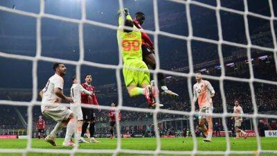 Paulo Dybala - Tammy Abraham - Kyle Walker - Theo Hernandez - Mike Maignan - Abraham and Felix fire Milan past Roma and into Coppa semi-finals - channelnewsasia.com