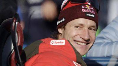 Alpine skiing-Odermatt lives up to favourite tag with super-G gold