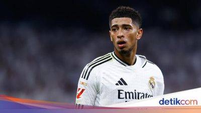 Jude Bellingham - Santiago Bernabéu - Derby Madrid - Jude Bellingham Dikecam Usai Maki-maki Hakim Garis di Derby Madrid - sport.detik.com