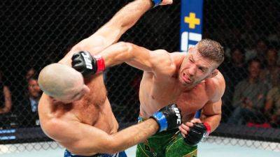 Sean Strickland - Du Plessis - Khamzat Chimaev - Alex Pereira - Dricus Du Plessis routs Sean Strickland in title rematch at UFC 312 - ESPN - espn.com - South Africa