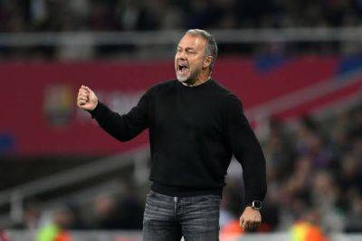 Barca defying expectations with treble fight -Flick