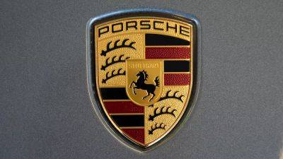International - Porsche shares fall as company warns of lower sales - euronews.com - Germany - China