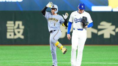 Hanshin Tigers shut out Cubs, Dodgers for back-to-back wins - ESPN