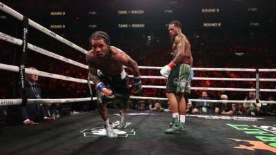 Davis, Roach fight to majority draw after knockdown controversy - ESPN