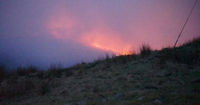 Live: A-road closed as dozens of firefighters tackle moor blaze