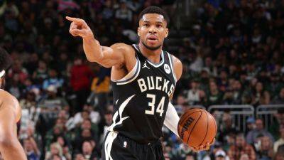 Bucks' Giannis Antetokounmpo out vs. Nuggets due to foot sprain - ESPN