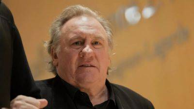 Accuser tells court actor Gérard Depardieu groped her bottom, breasts on film set