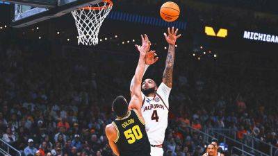 Johni Broome, Auburn flex their muscles in Sweet 16 win over Michigan