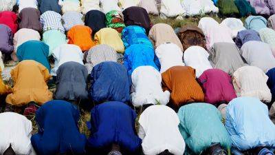 Muslims celebrate Eid al-Fitr around the world as holy month of Ramadan comes to a close
