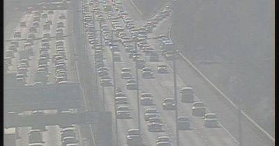 M60 chaos LIVE as motorway hit by delays following police incident - latest updates