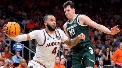 Auburn into Final Four over MSU amid Broome injury scare - ESPN