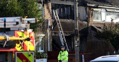 Major emergency response on Greater Manchester street as smoke billows from house
