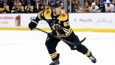 Sources - Gap in money led to Bruins trading Brad Marchand to Panthers - ESPN