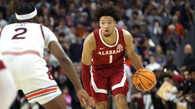 Alabama's Sears hits floater at buzzer to upset No. 1 Auburn - ESPN