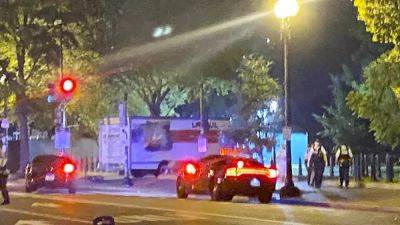 Breaking news. Armed man shot near White House by US Secret Service agents